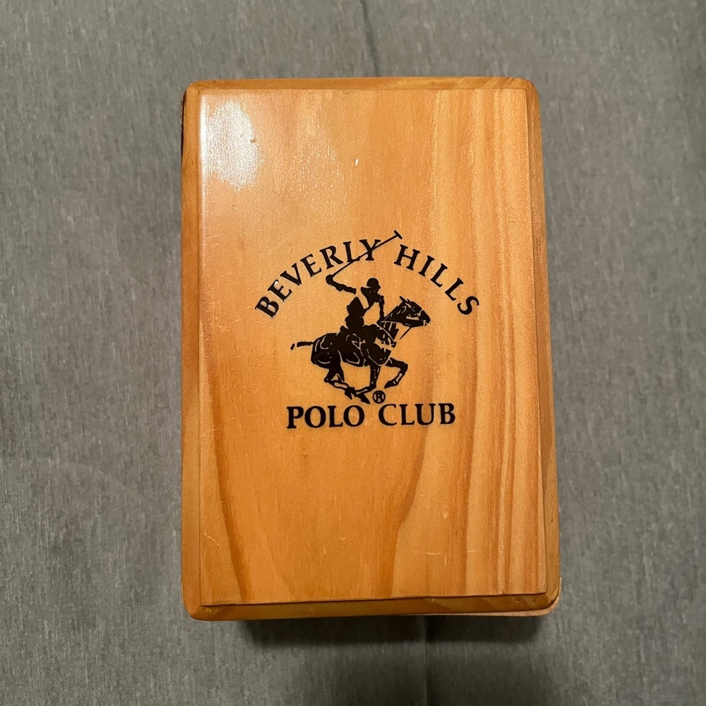 Brown Wooden Watch Box with Polished Surface and Elegant Design